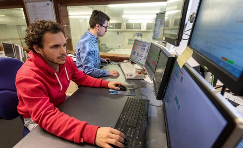 Immanuel Vinke and Edgar Romero working in the IAAPS control room Immanuel Vinke and Edgar Romero working in the IAAPS control room