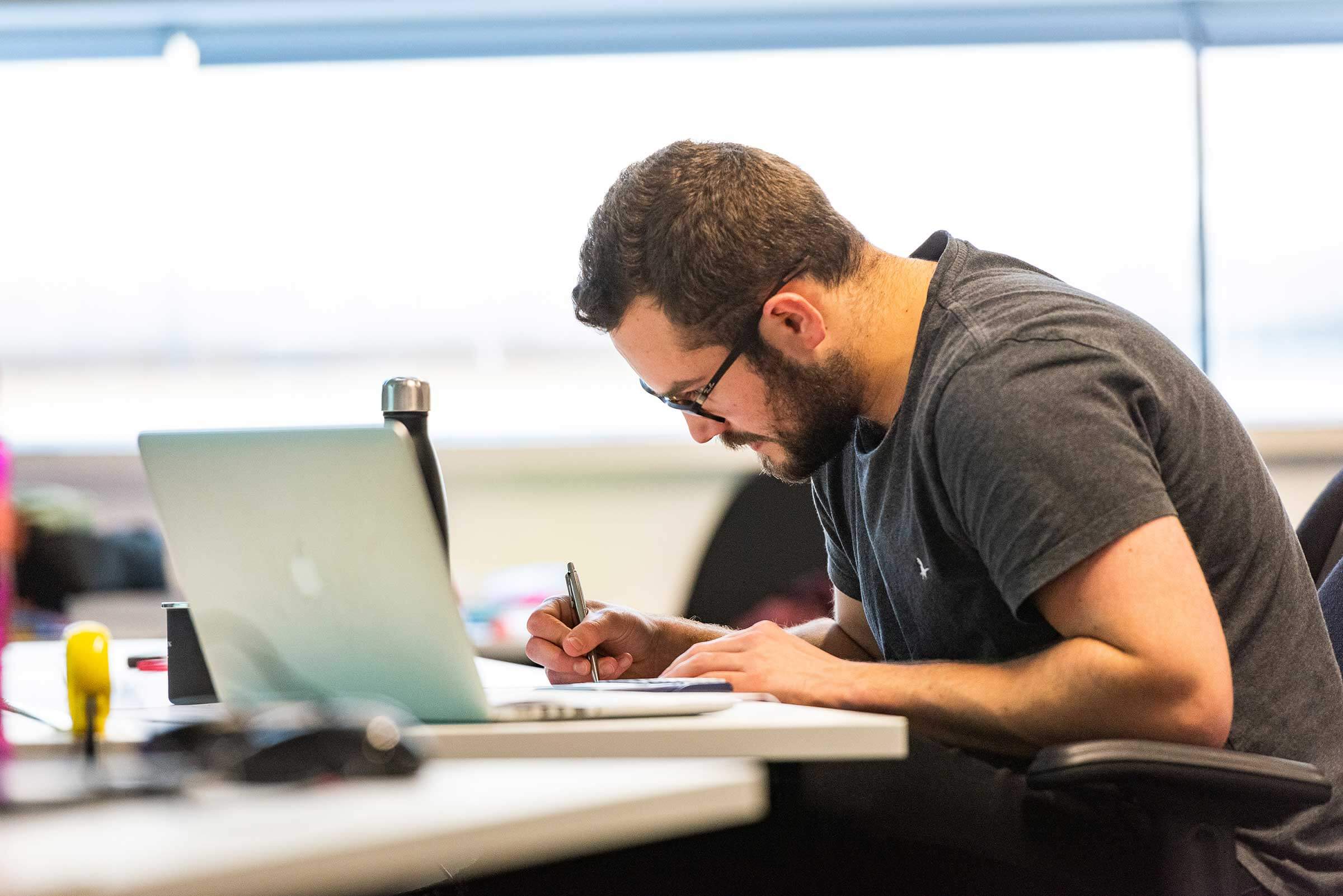 Alex Young working in study room